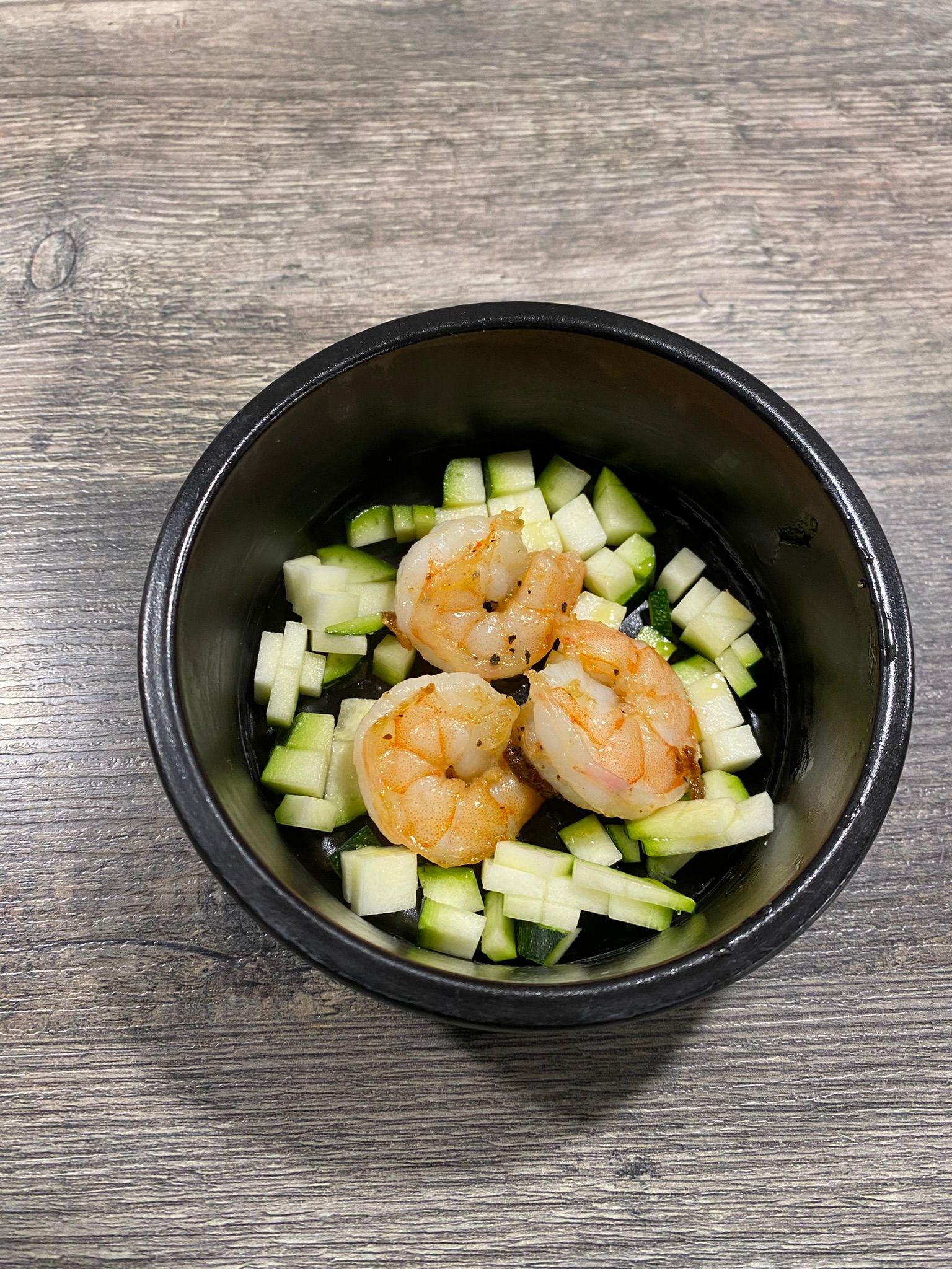 Scampi met gestoofde courgette